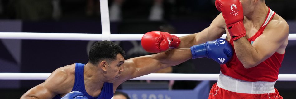 Ayoub Ghadfa peleando en los Juegos Olímpicos de París (Fotografía del COE)